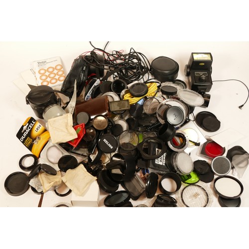 241 - A selection of camera filters, lens cases, leads and flashlights.