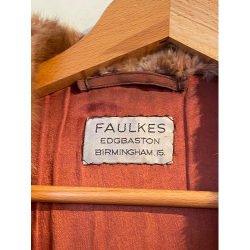 265 - Fur jacket by Faulkes of Edgbaston, Birmingham, 110cm chest, 102cm length. A black coney fur jacket,... 