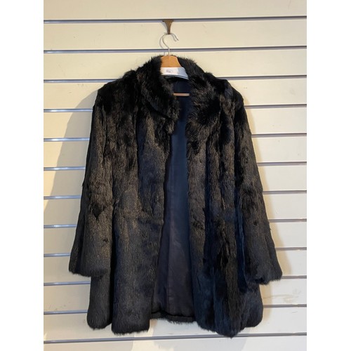 265 - Fur jacket by Faulkes of Edgbaston, Birmingham, 110cm chest, 102cm length. A black coney fur jacket,... 