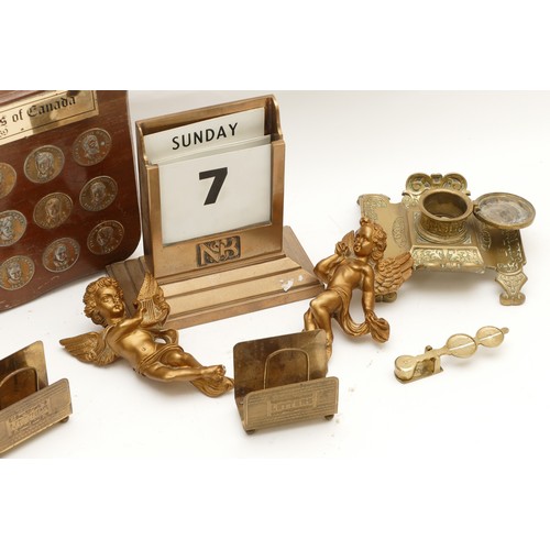 271 - A collection of brass and metalwares, to include, two letter stands, a desk calendar, an inkwell, fi... 