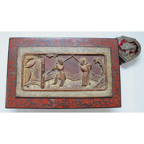 294 - A large oriental retangular cinnabar lacquer box and carved cover, inlaid throughout with dragons, t... 