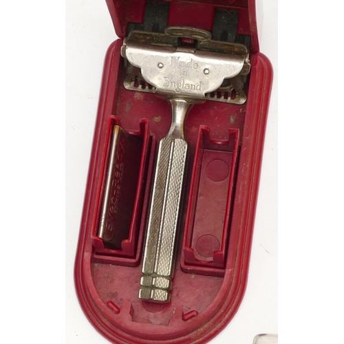 296 - A 1920s/30s Wilkinson Swords gents razor/set, complete in fitted traveling case, together with three... 