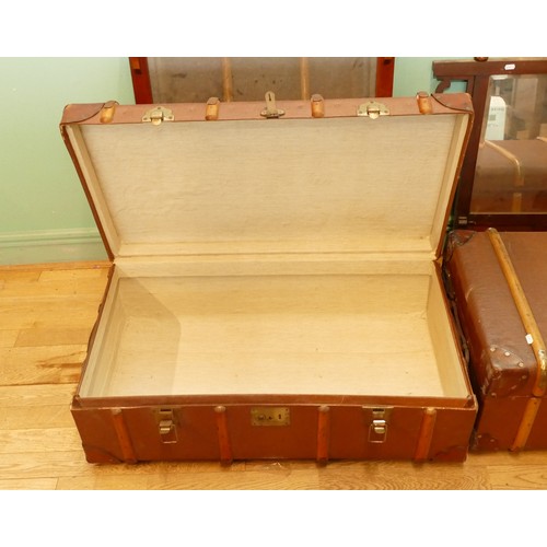 308 - A pair of large early 20th century traveling trunks, together with two Edwardian mahogany overmantle... 