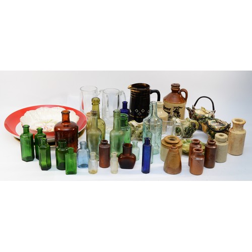 334 - A collection of ceramics, glassware and collectables, to include Edwardian glass pop bottles, stonew... 