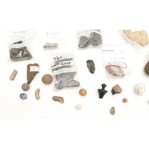 342 - A collection of East Yorkshire archaeological finds, to include a Roman bronze mask 5.5cm, bronze ag... 