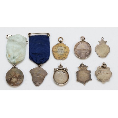 357 - Eight various silver medals/fobs, 70gm