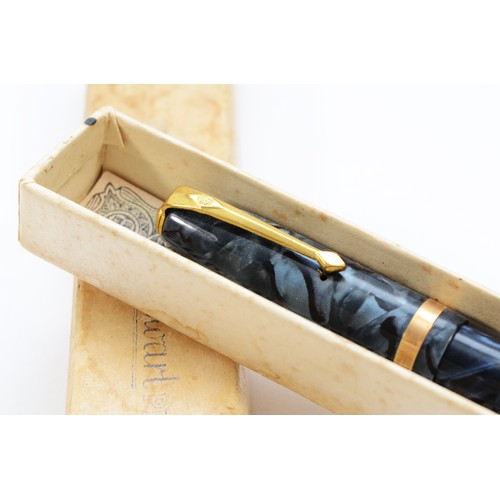 362 - Conway Stewart, a blue mottled lever action fountain pen with 14ct gold nib, box and original guaran... 