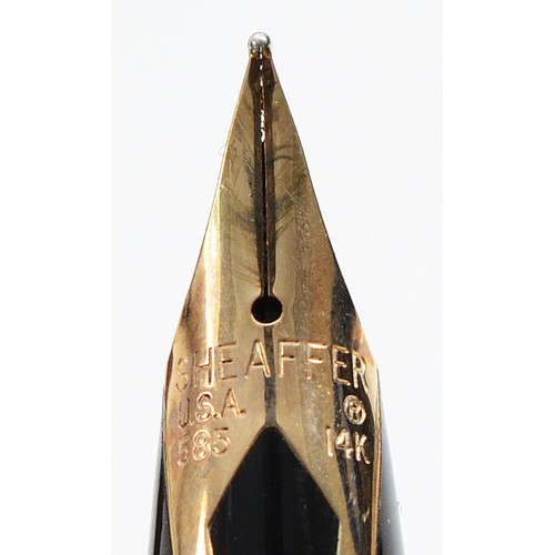 365 - Sheaffer, a black resin squeeze action fountain pen with 14K gold nib, case