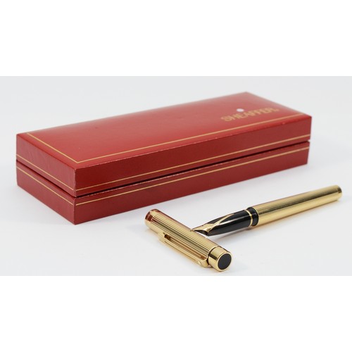 366 - Sheaffer, a gold plated squeeze action fountain pen with 14K gold nib, case