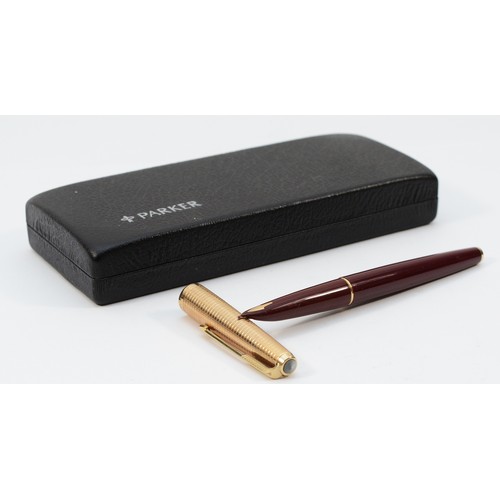 367 - Sheaffer, a black resin squeeze action fountain pen with 14K gold nib, case