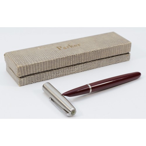 369 - Parker 51, a burgundy body and stainless steel cap squeeze action fountain pen, case