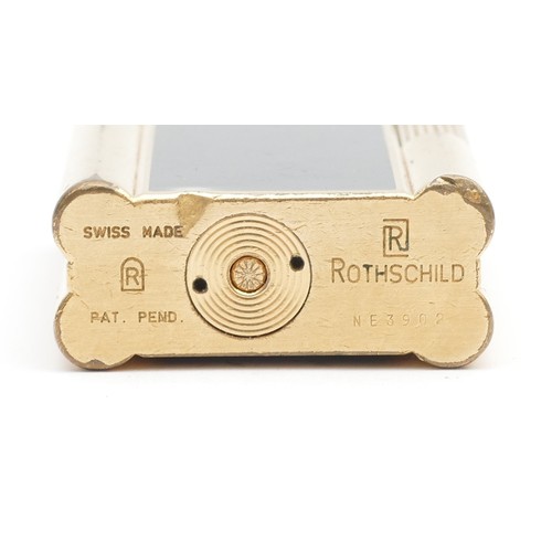 382 - A Rothschild pocket gas cigarette lighter, gold plated with black enamelled panels, boxed with outer... 