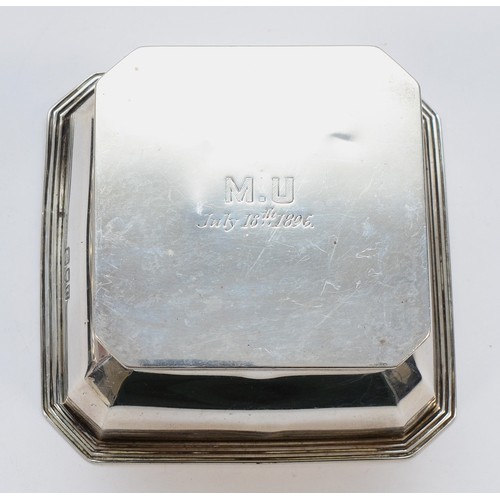 390 - A Victorian silver and glass square capstan inkwell, London 1896, contemporary initials and date, 8.... 