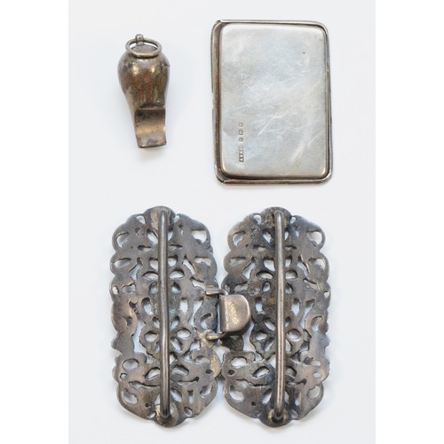 418 - A cast silver nursed buckle. Birmingham 1893, together with an engraved stamp case, Birmingham 1906,... 