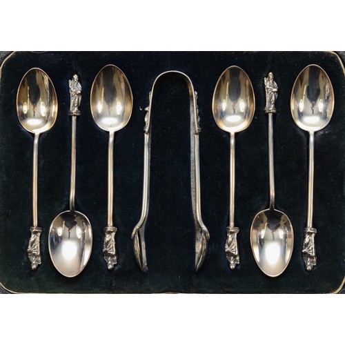 441 - A set of six silver Apostle spoons with matching sugar tongs, Sheffield 1912, cased, together with a... 