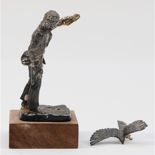 447 - A Silver ornament of 'The Falconer' made by Ammonite Ltd, Birmingham 1979, base marked Birmingham 19... 