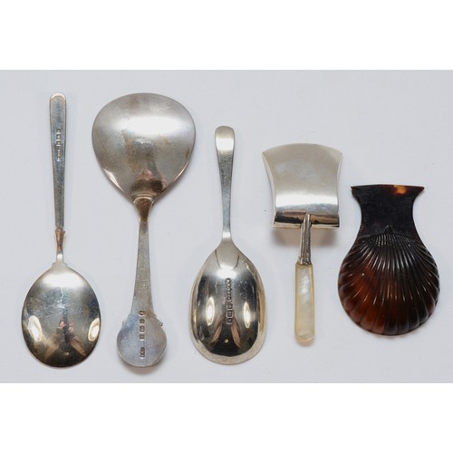 458 - A Georgian tortoiseshell caddy spoon, a Georgian silver and mother of pearl shovel caddy spoon, Birm... 