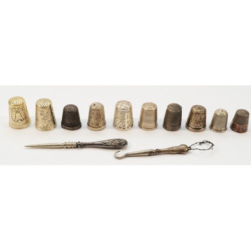 480 - Ten various silver thimbles, together with a silver button loop and an unmarked awl tool, 53gm (12).