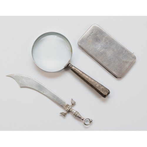 485 - A silver handled magnifying glass, Sheffield 1912, together with a silver notebook holder engraved H... 