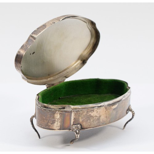 508 - An oval silver trinket box, Birmingham 1921, with velvet liner, raised on four feet, 10.5 x 6cm