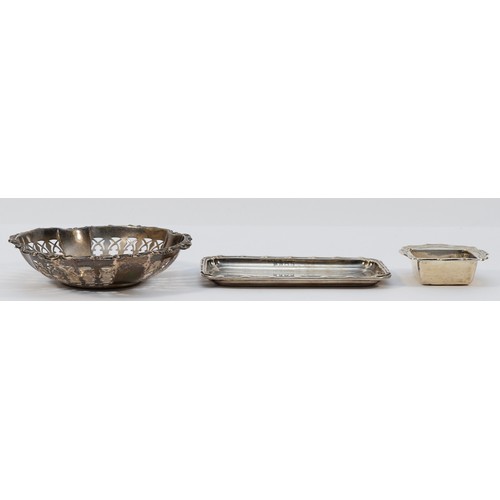 517 - A circular silver pierced dish, Birmingham 1910, 11cm, and two other silver dishes (3), 93gm