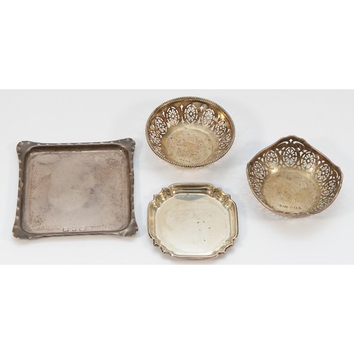 518 - A Victorian square silver dish, Birmingham 1889, 10 x 10cm and three other silver dishes, 124gm (4)