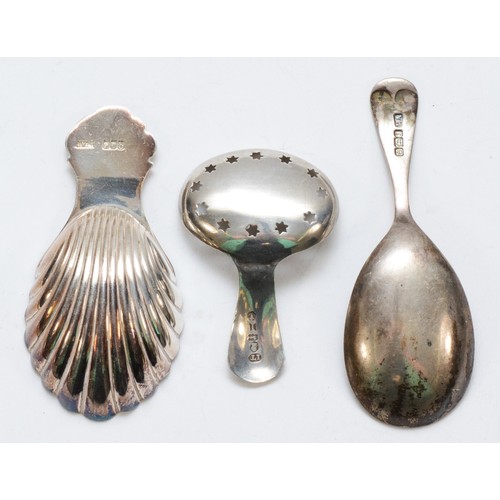 539 - A George III bight cut silver pierced caddy spoon, Birmingham 1809 and two later examples, 45gm