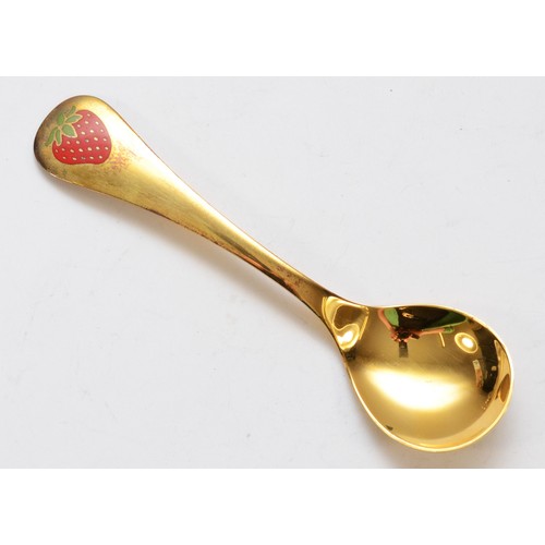 544 - Annelise Bjorner for Georg Jensen, a silver gilt and enamel 2001 year spoon, 14.5cm, 44gm, case