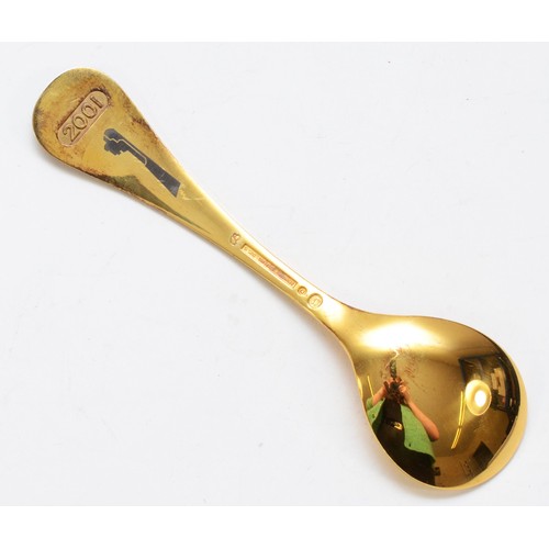 544 - Annelise Bjorner for Georg Jensen, a silver gilt and enamel 2001 year spoon, 14.5cm, 44gm, case