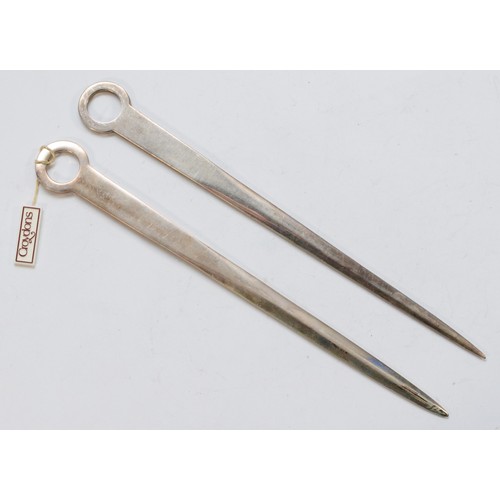 548 - A silver ring handled letter opener, by Francis Howard, Sheffield 1961, 21cm and another similar, by... 