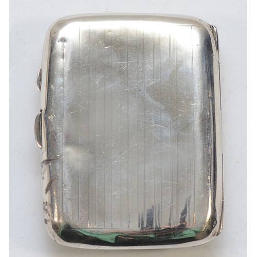 555 - A silver cigarette case with engraved initials to the front, Birmingham 1919, 8.5x6.5cm, 63gm.