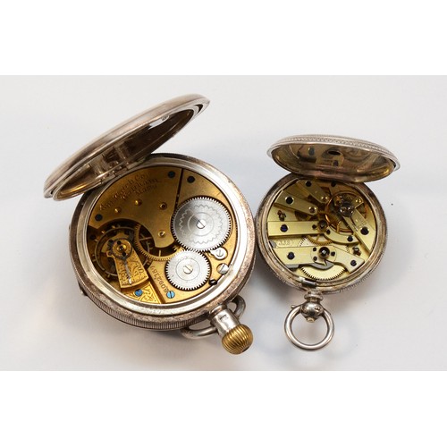 592 - Waltham, a silver keyless wind open face pocket watch, Birmingham 1899 and a ladies silver key wind ... 