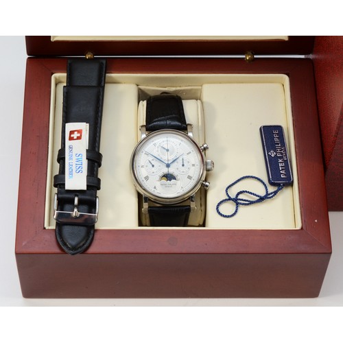 612 - A stainless steel manual wind multi dial fashion wristwatch with visible movement, case