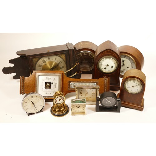 661 - A collection of mid twentieth-century and later mantel clocks, wall clocks and barometers, to includ... 