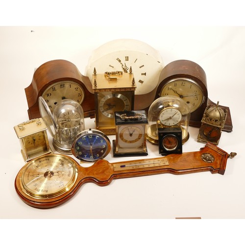 663 - A collection of mid twentieth-century and later mantel clocks, wall clocks and barometers, to includ... 