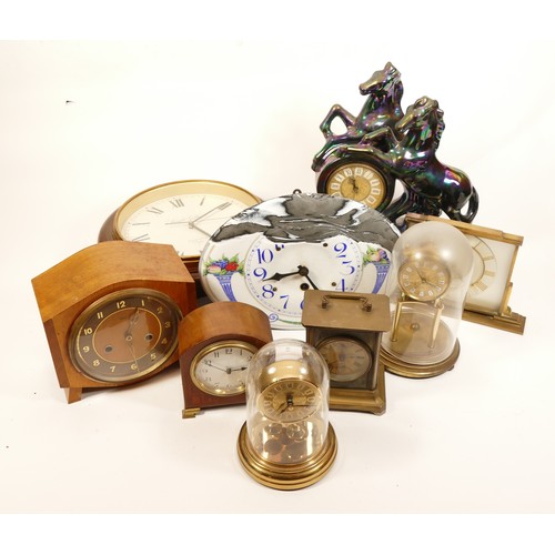 668 - A collection of mid twentieth-century and later mantel clocks, wall clocks and barometers, to includ... 