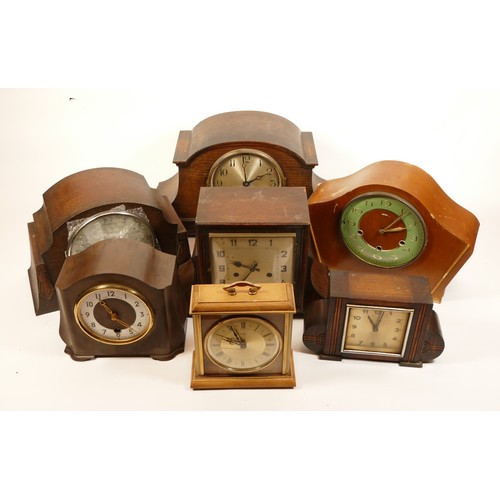 669 - A collection of mid twentieth-century and later mantel clocks, wall clocks and barometers, to includ... 