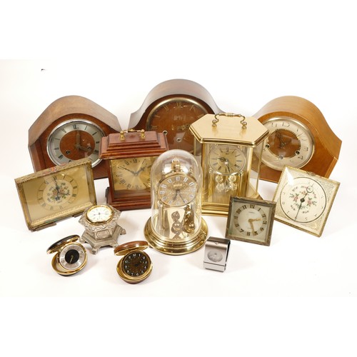 672 - A collection of mid twentieth-century and later mantel clocks, wall clocks and barometers, to includ... 