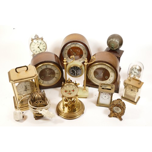 674 - A collection of mid twentieth-century and later mantel clocks, wall clocks and barometers, to includ... 