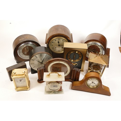 679 - A collection of mid twentieth-century and later mantel clocks, wall clocks and barometers, to includ... 