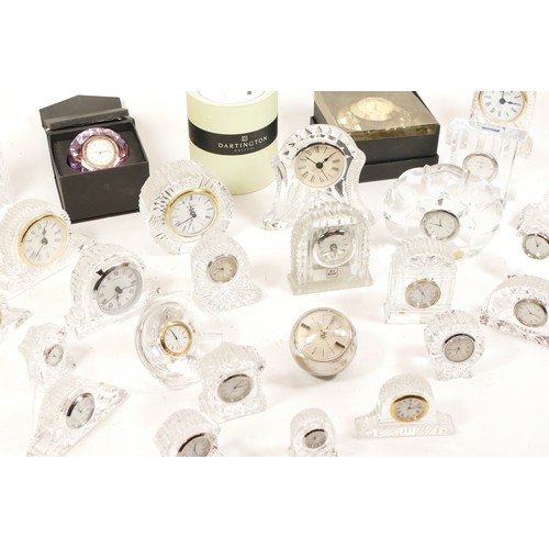 686 - A selection of crystal glass mantel clocks, bedside clocks and miniature novelty clocks, makers to i... 