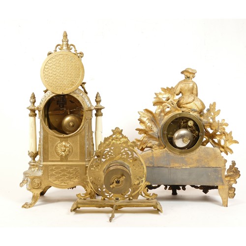 689 - Three gilt-metal Italinate mantel clocks, in the style of Louis XV. (3)