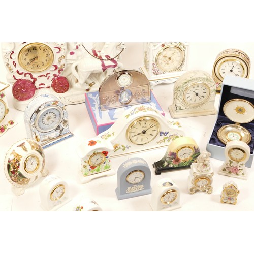 690 - A selection of ceramic mantel clocks, bedside clocks and miniature novelty clocks, makers to include... 