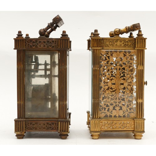 697 - Two early twentieth century brass carriage clocks, having enamelled dials with Roman numerals, housi... 