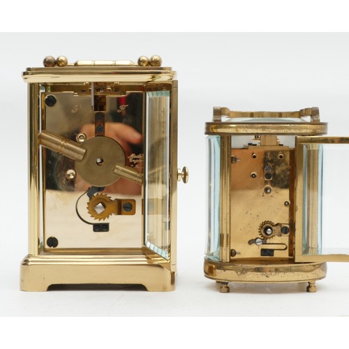 699 - Two mid to late twentieth century brass carriage clocks, housing 8 day movements, JW Benson, in the ... 