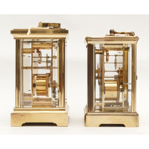 700 - Two mid to late twentieth century brass carriage clocks, having enamelled dials featuring both Roman... 