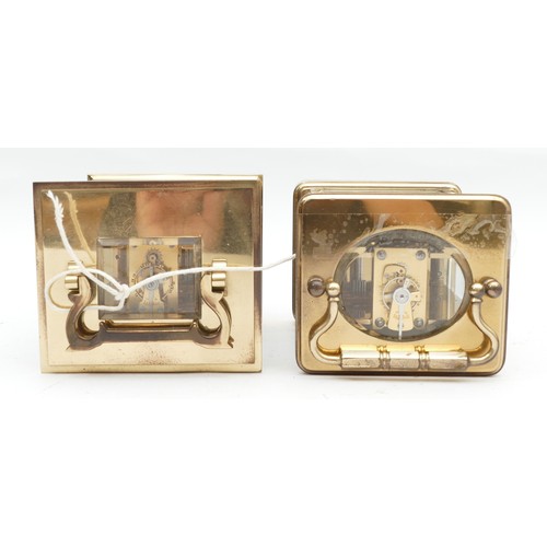 700 - Two mid to late twentieth century brass carriage clocks, having enamelled dials featuring both Roman... 