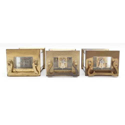 702 - Three mid to late twentieth century brass carriage clocks, having enamelled dials and featuring Roma... 