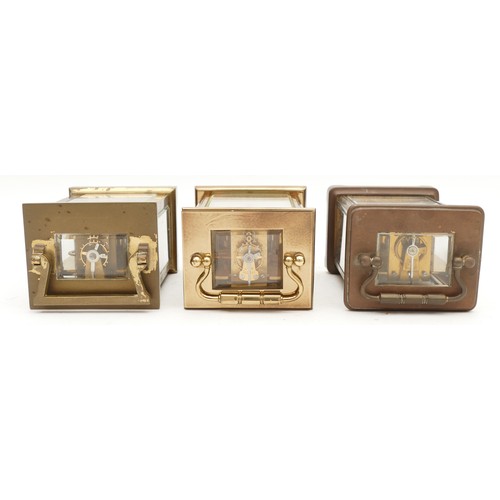 705 - Three mid to late twentieth century brass carriage clocks, having enamelled dials and housing 8 day ... 