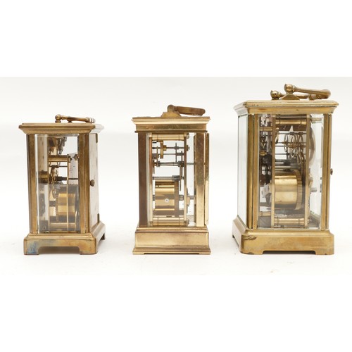 706 - Three early to mid twentieth century brass carriage clocks, housing 8 day movements, two examples co... 